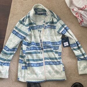 Brand new, warm jacket with tag. Looks cool and is warm! Pockets in front too